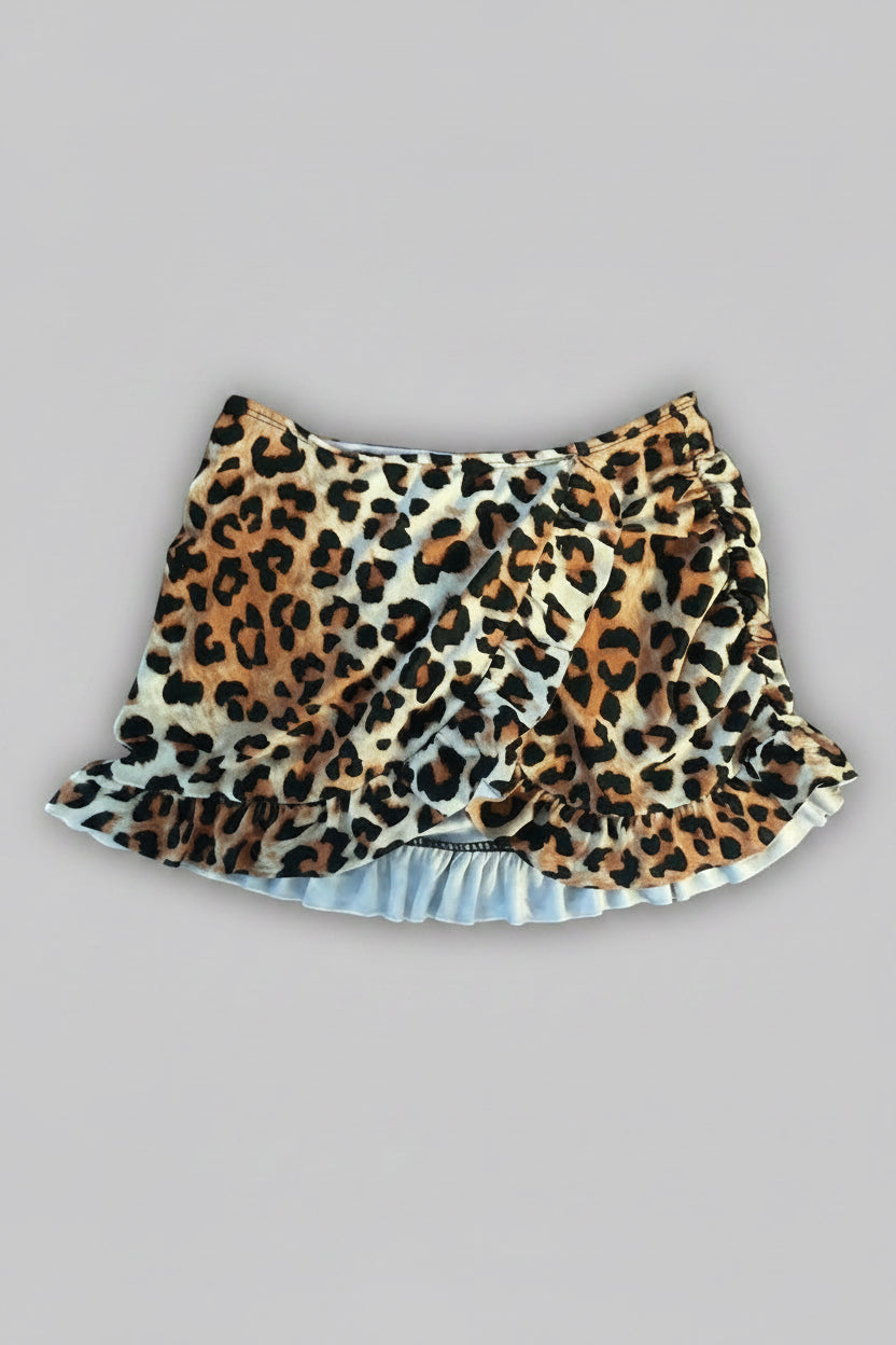 Leopard print mini skirt on a grey background 